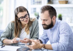 Two People Discussing Finance.